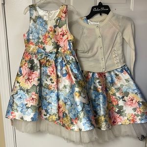 Matching flowered fancy dresses with coordinating cardigans